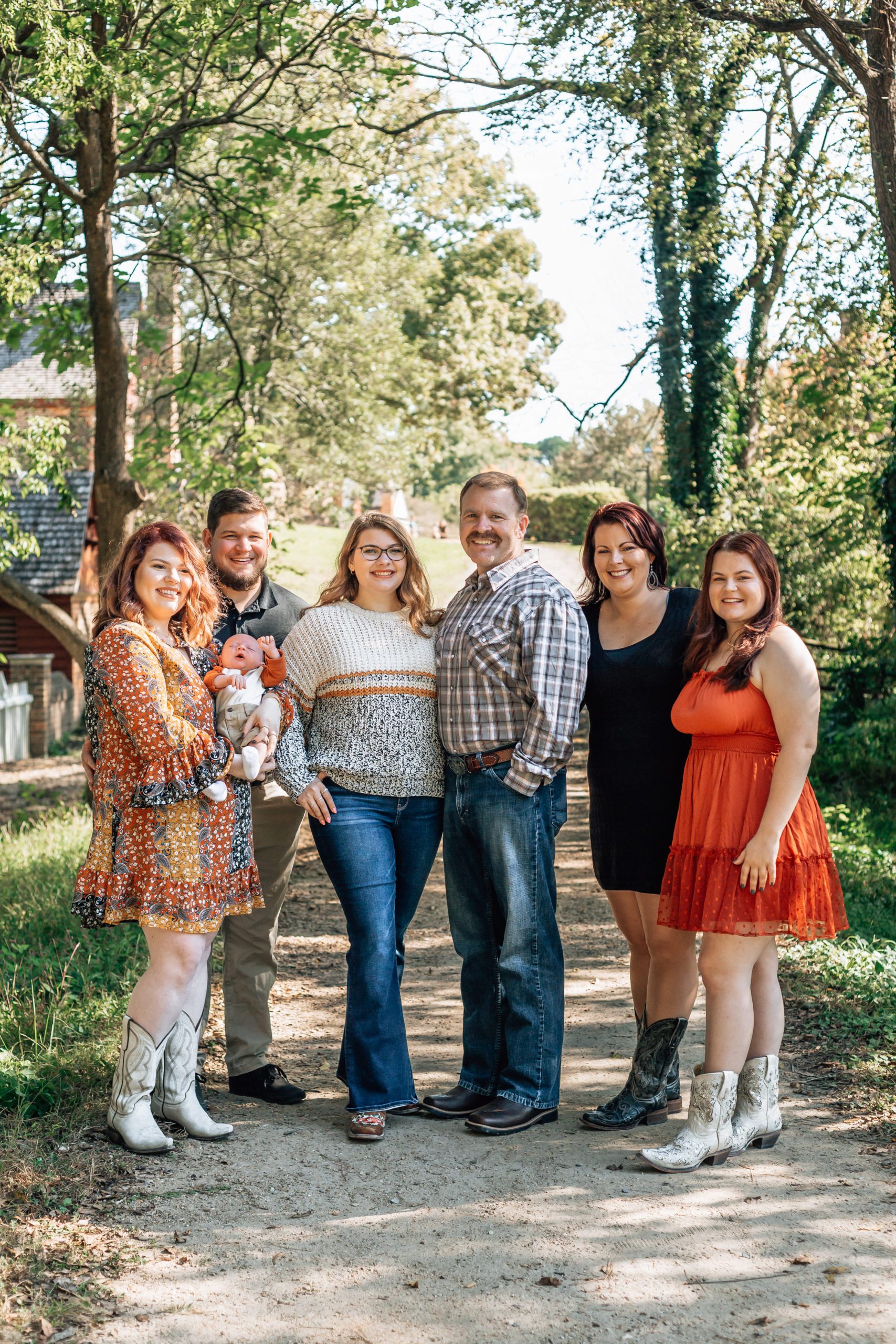 best Hampton Roads family photographer captured a famil yog three generation together for their outdoor family photoshoot