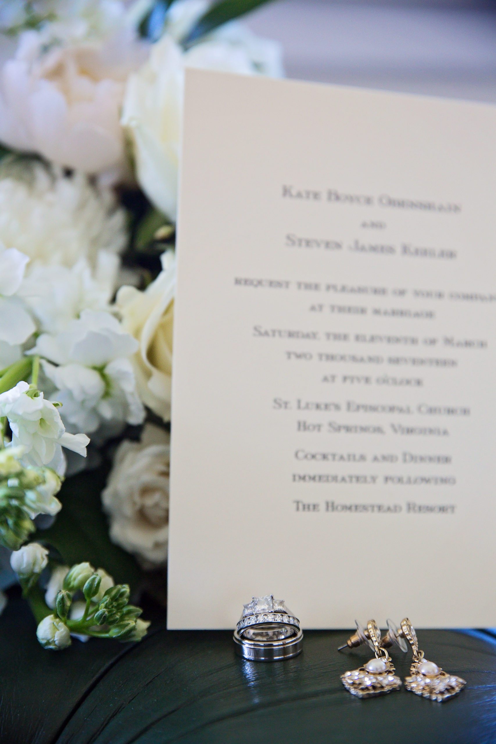 detail shot of wedding invitations moments while getting ready